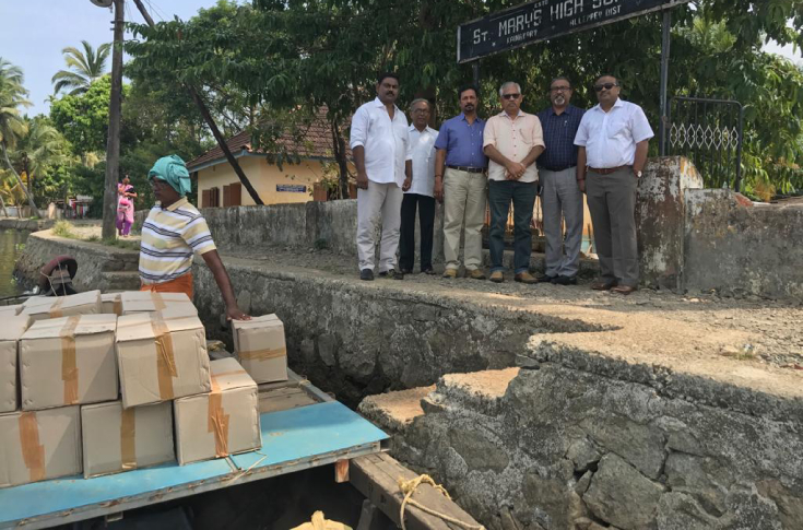 KMPA donates notebooks to flood-affected students