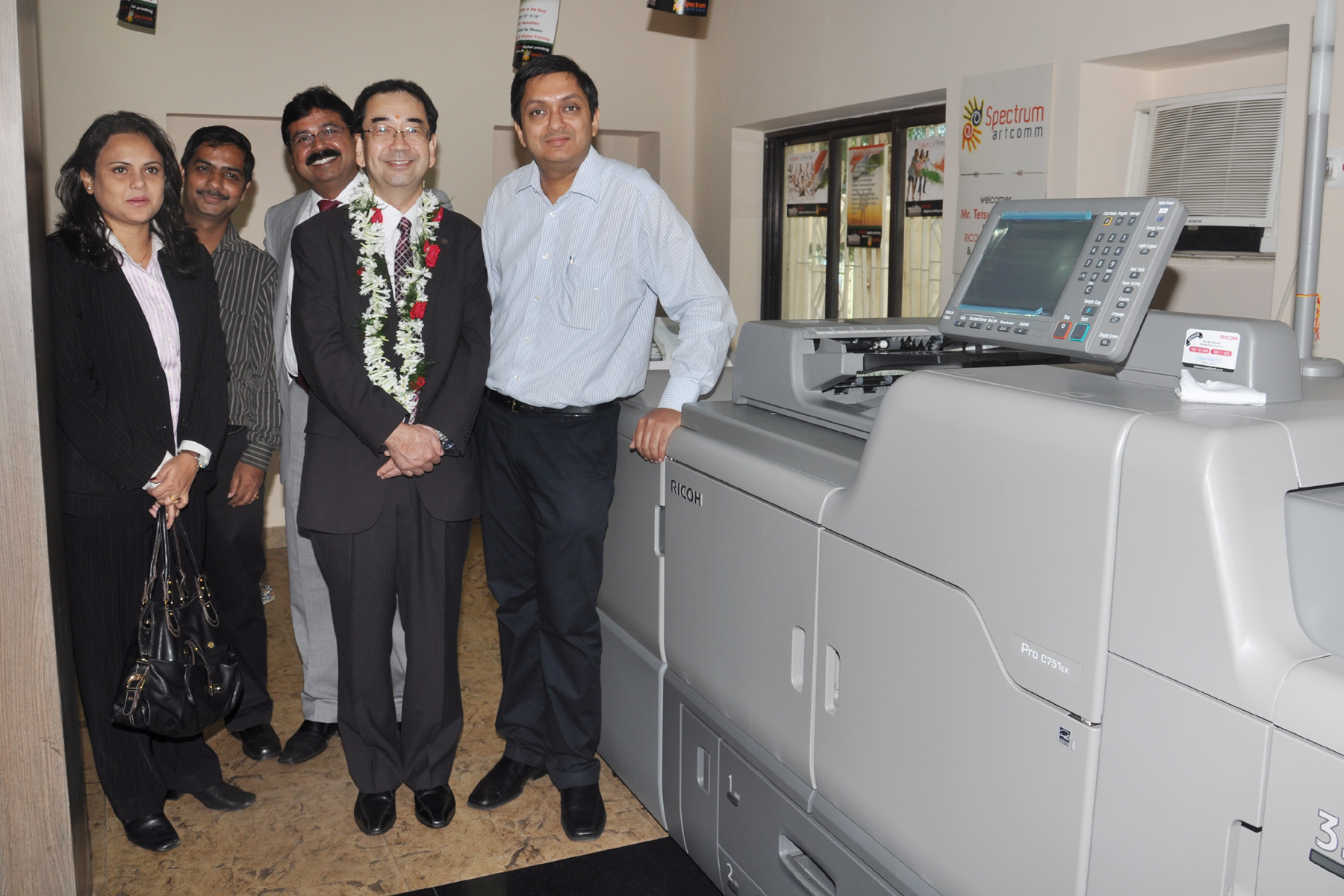 Spectrum Artcomm pumps photo-printing plans with Ricoh 751EX