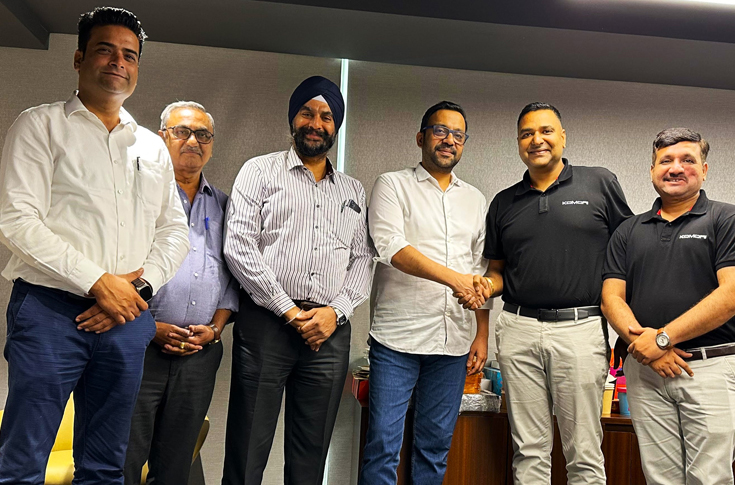Canpac Trends team and Komori representatives discussing installation of six and seven colour Komori Lithrone G Series presses with UV coaters for high speed packaging and commercial printing production