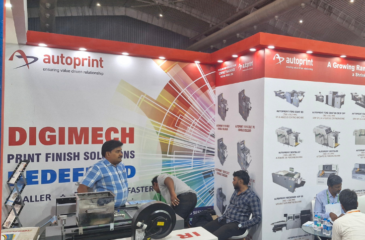 Visitors exploring advanced printing, packaging, and post-press solutions from Autoprint, Boxtech, Megabound, Redington-HP, and other exhibitors at Bharat Print Expo 2025 in Bengaluru