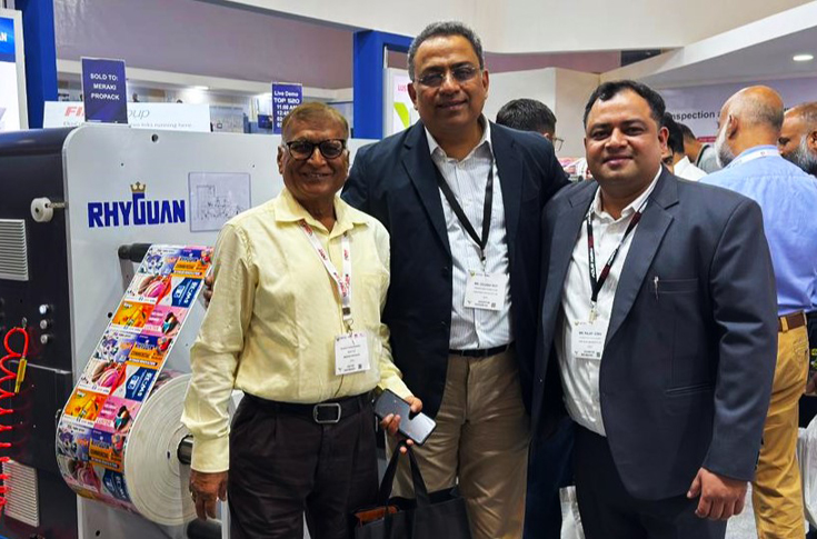 Gunjan Agrawal of Meraki Propack discussing installation of Rhyguan TOP 520 die-cutting machine for large-format in-mould label production at Gurugram facility