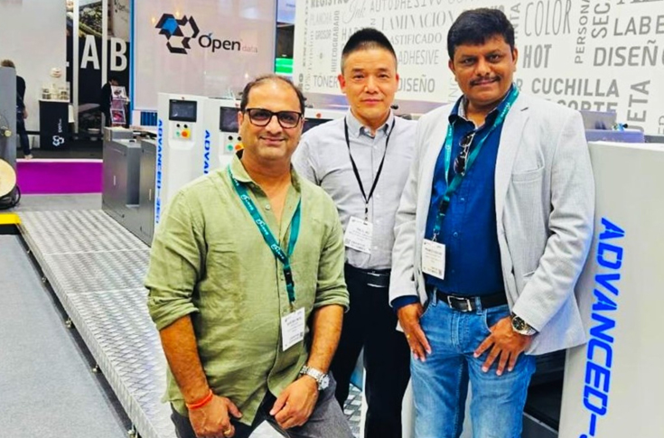 Wanjie India live demonstration setup at Labelexpo Asia 2025 featuring WJPS-350 intermittent offset and flexo label presses with rotary die-cutting systems showcasing automated label printing and finishing operations