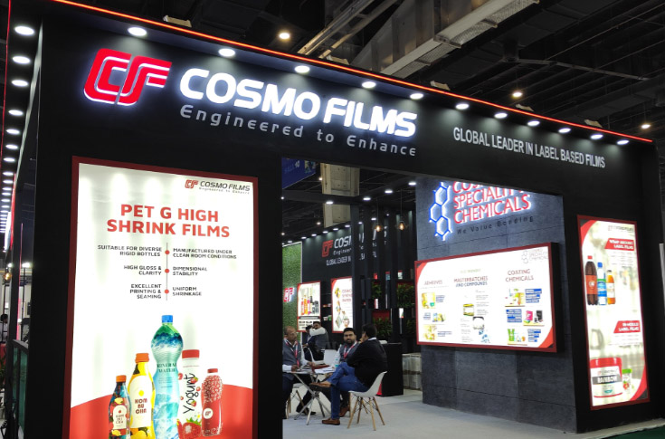 Cosmo Films representative Kulbhushan Malik discussing innovative labelling materials including PET-G, in-mould label films, wraparound films, and Cosmo Synthetic Paper at industry exhibition