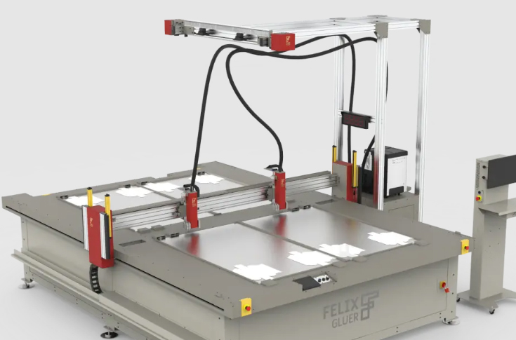 Felix Gluer showcase at Drupa featuring the Duet dual-head gluing system, PhotoShape interface, Valco Melton-powered melters, and advanced worktable accessories for precision adhesive applications