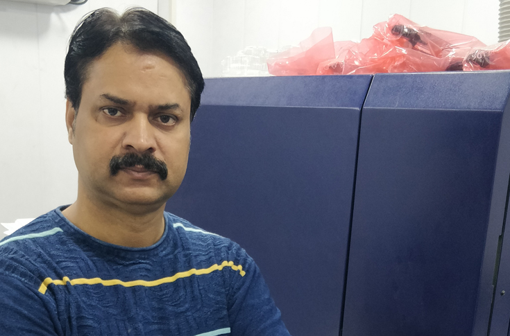Modern printing facility in Lucknow featuring Konica Minolta C6085, C12000, and C8000 digital presses with MGI finishing equipment producing high-quality colour and commercial print jobs