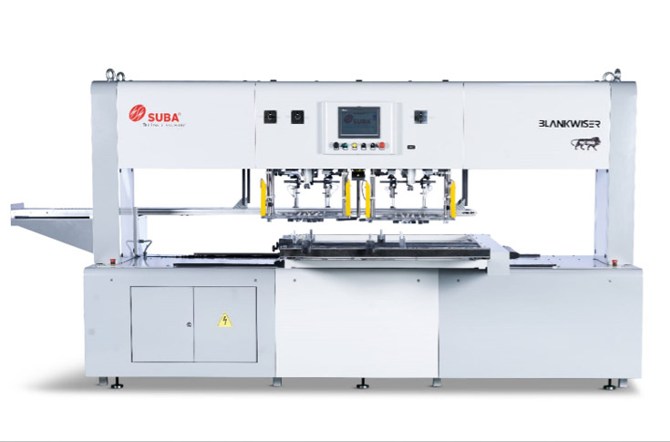 Suba Solutions booth at Pamex displaying carton-erecting machine and Blankwiser blanking system used for tray and burger box production, highlighting automated packaging solutions, Lamify flute laminators, and high-speed production equipment