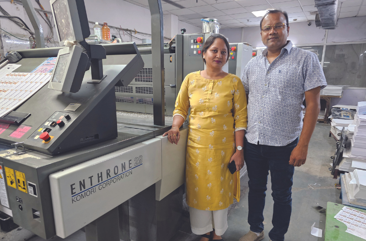Interview with a Delhi-based commercial and book printer operating Amit Computer Graphics and Shruti Printers, detailing use of multiple Komori printing presses for commercial jobs and books, highlighting efficiency, fast changeovers, substrate versatility, low maintenance, and expansion to eight Komori machines with plans for further growth