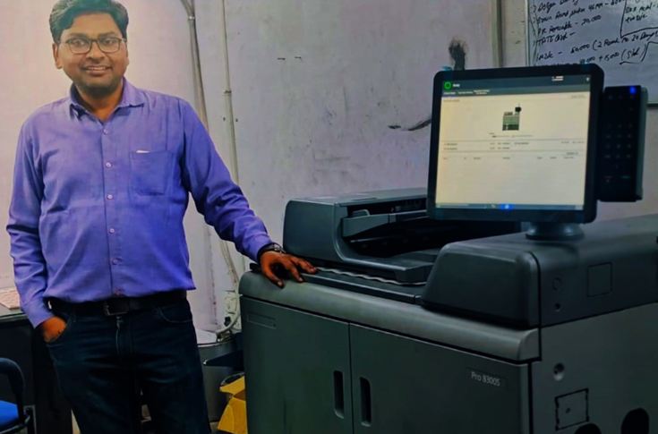 Ricoh Pro 8300S black-and-white digital production press at Akeh Services print facility producing high-speed monochrome prints for commercial customers across North India