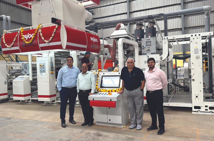 Champion Packaging Industries discussing Rajoo Engineers extrusion coating and lamination machine used for flexible packaging applications in food, snack, and pharma industries, improving bond strength, shelf life, and production efficiency