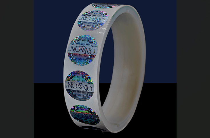 Holostik exhibit featuring sustainable paper labels, holograms, and authentication solutions with track-and-trace and blockchain-based security technologies at Labelexpo