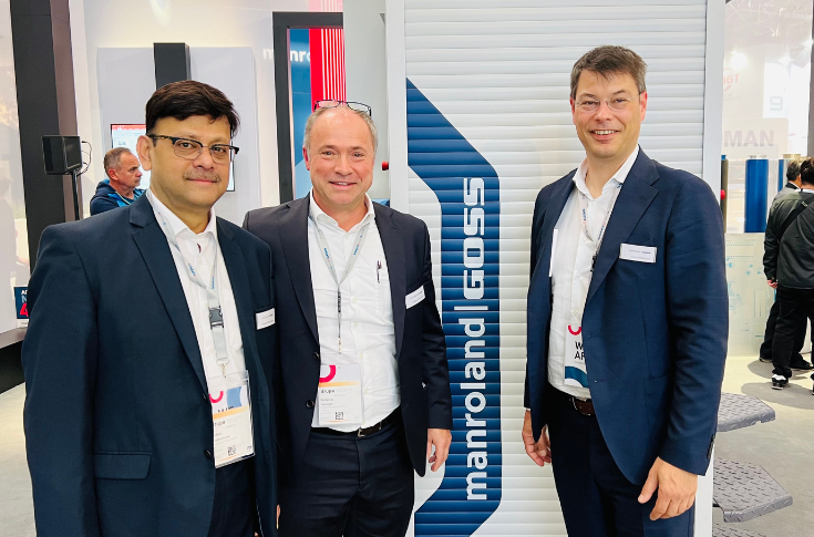 Franz Kriechbaum and Wolfgang Hiesinger discuss Manroland Goss innovations at Drupa, featuring the Varioman printing unit and advanced packaging print applications