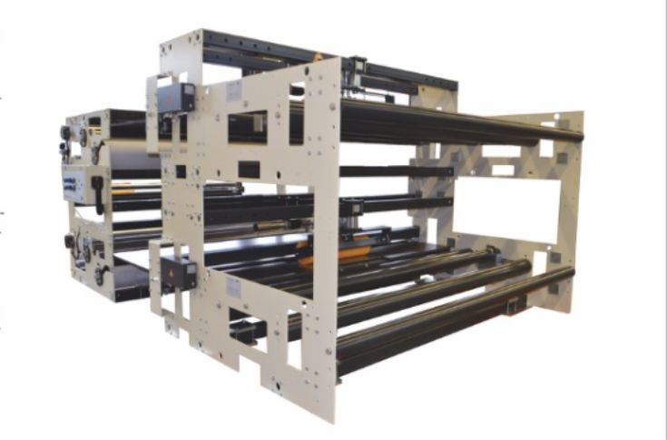 Erhardt & Leimer Corraligner web alignment system and Tension Master controller installed on a corrugation line, ensuring precise paper alignment, tension control, and high-quality corrugated board production