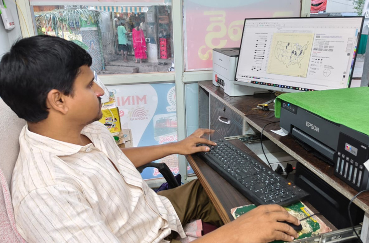 Portrait of Durga Prasad, a print industry professional with a physical disability, working in pre-press and Braille printing, symbolizing resilience and career achievement