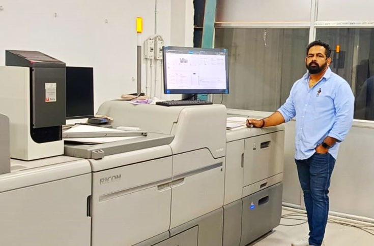 Visakha Design Studio printing facility using Ricoh Pro C7500 digital press with fifth-colour capabilities for garment packaging materials such as hang tags, labels, cartons, and boxes with metallic and textured effects