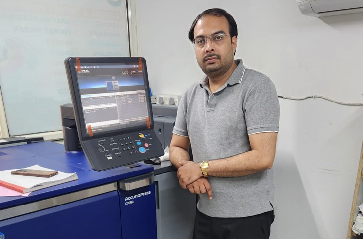 Overview of Om Enterprises printing operations featuring Konica Minolta AccurioPress C7090 digital press used for multicolour and offset printing, barcode label production and sticker printing services serving clients such as hospitals and industrial sectors