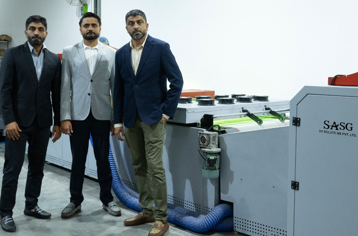 Concord Printing facility showcasing UV printing and embellishment equipment with advanced sheet-fed UV dryer in operation producing high-quality printed materials