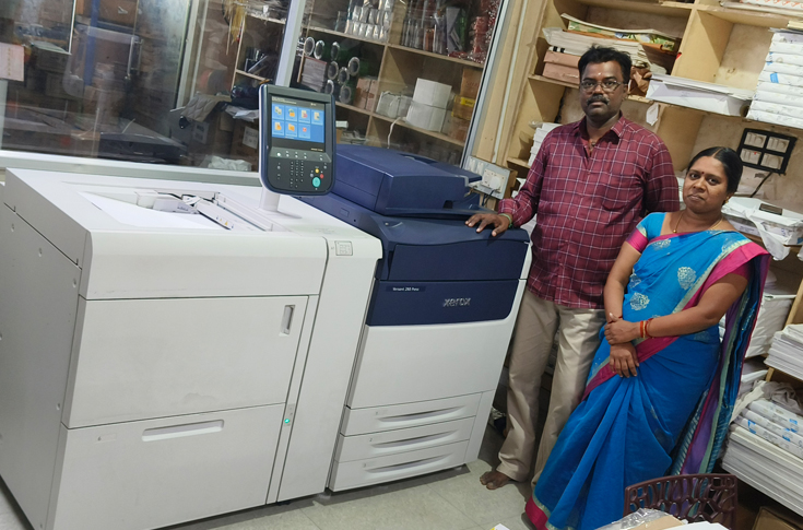 SK Marketing operating the Xerox Versant 280 for digital printing, ID card production, and short-run commercial applications