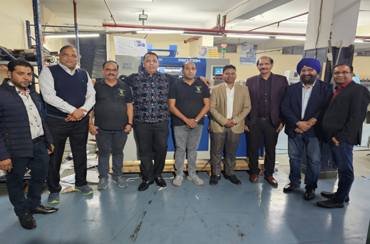 Graphic Impex Services showcasing the QS-100C three-knife trimmer designed for efficient, safe, and high-quality bookbinding operations for Indian manufacturers
