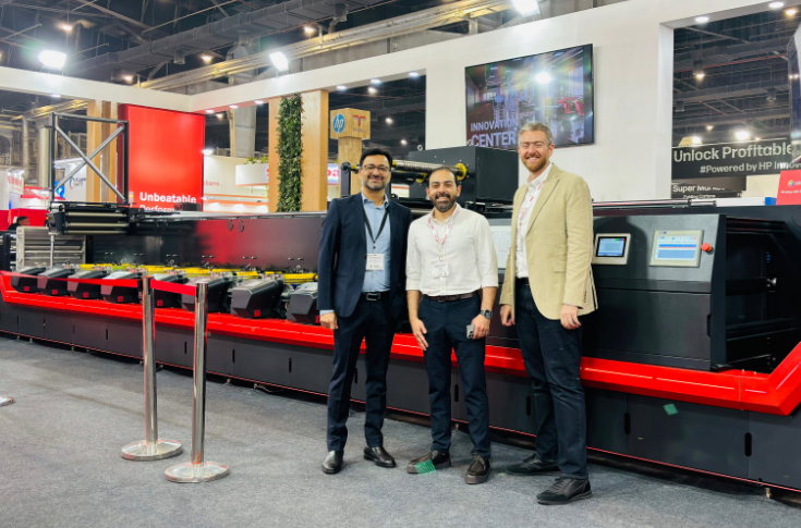 Multitec S2 mid-web flexo press showcased at Labelexpo India 2024 demonstrating high-speed label and shrink sleeve printing with advanced servo and UV curing systems