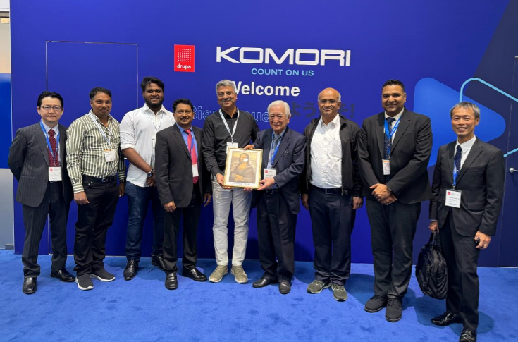 Kora Pack printing facility with Komori Lithrone offset presses in operation, including high-speed packaging press setup demonstrating improved make-ready time, reduced paper waste, and advanced UV printing capabilities