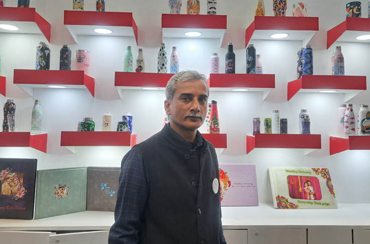 Krishant Kant Jha of 3S Graphic Solutions discussing new bottle printing and drum grooving machines, service commitments, and early deal closures at PrintPack 2025