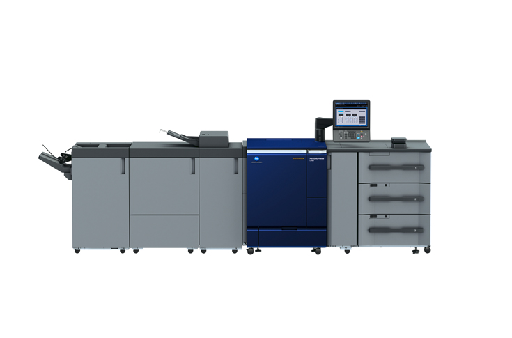 Konica Minolta display featuring AccurioLabel presses, AccurioPress production systems, MGI AccurioShine embellishment technology, and AccurioPro workflow software demonstrating automated, high-quality print and packaging solutions