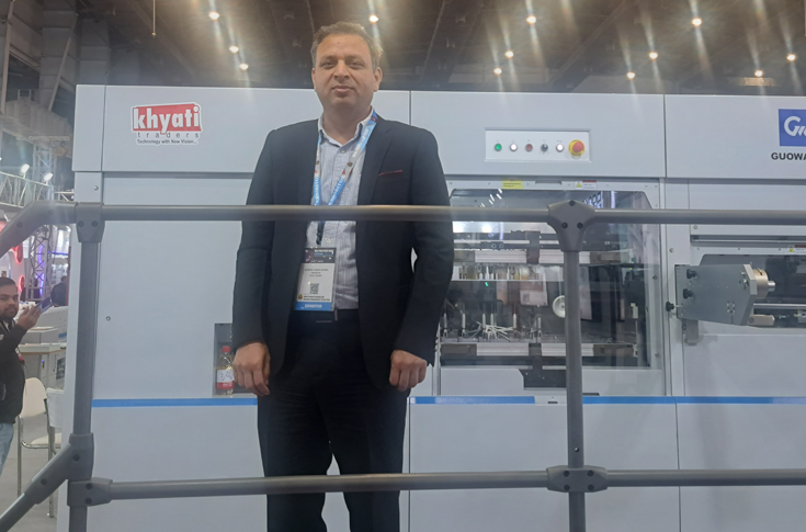 Ravinder Sharma of Khyati Traders discussing the automatic stop cylinder screen press, repeat customer demand, and the company’s focus on sustainable and automated printing machinery