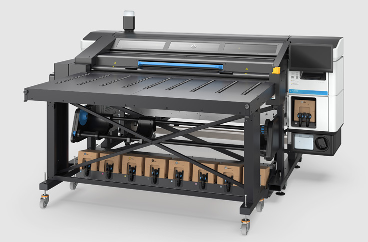 HP Latex R530 large-format printer showcased at Media Expo Mumbai 2025, demonstrating compact rigid and flexible printing capabilities with touchscreen controls and automated maintenance features