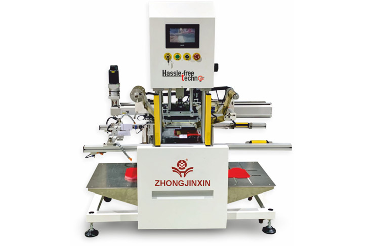 Hassle Free Techno booth at Pamex 2024 showcasing automatic hot foil stamping machine used for PVC cards, smart cards, business cards, clothing tags, and voucher coding with high-speed precision and automation