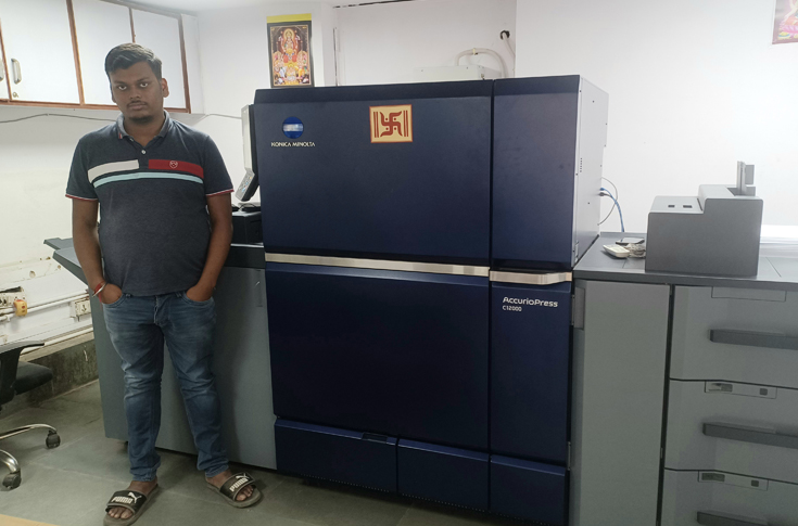 Konica Minolta AccurioPress C12000 and C6085 digital printing machines at SK Graphics production facility handling high-volume commercial print jobs with advanced print quality and efficiency in Kanpur