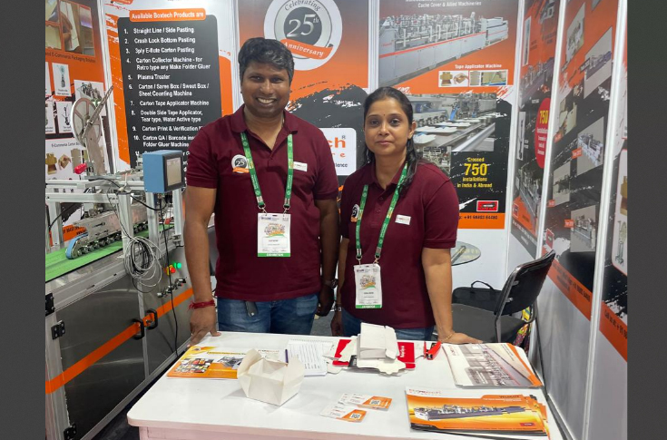 Boxtech display at Bharat Print Expo 2025 in Bengaluru featuring folder-gluer packaging machinery, with business discussions and order finalisation for new equipment during the printing and packaging industry exhibition