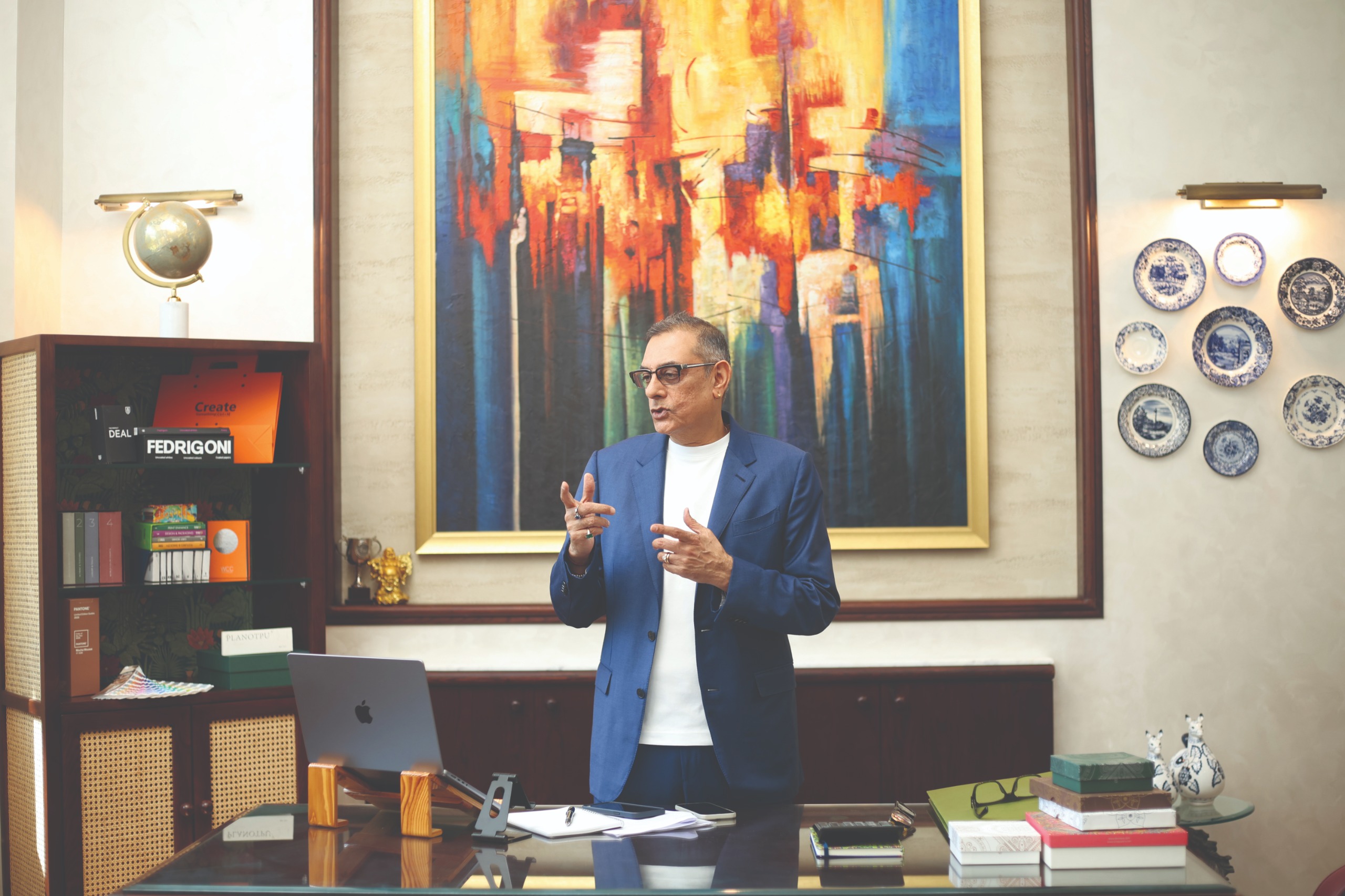 Atul Talwar of Decorpac showcasing premium retail packaging solutions, including luxury rigid boxes, carry bags, and high-end decorative packaging samples