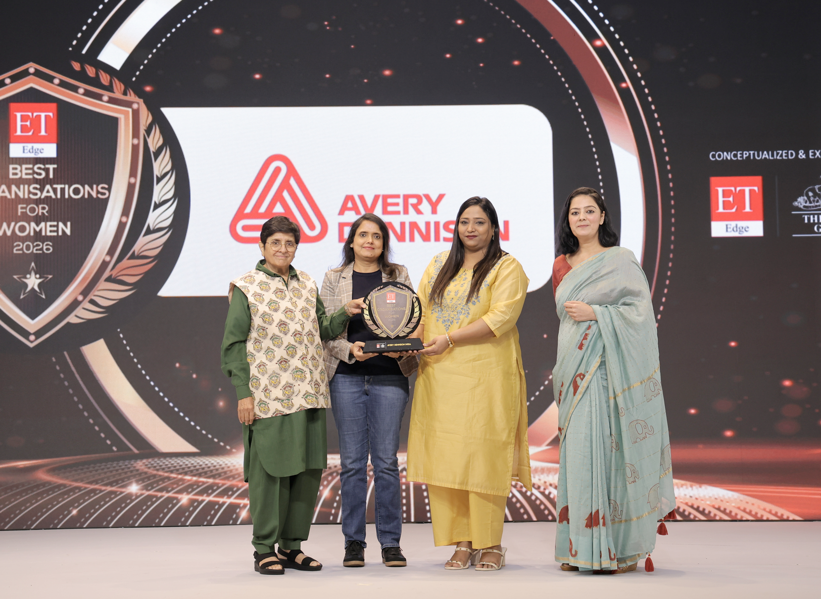 Corporate award ceremony recognising Avery Dennison as a Best Organisation for Women 2026, featuring leaders receiving the honour for promoting gender equity, inclusion, and women leadership in the workplace