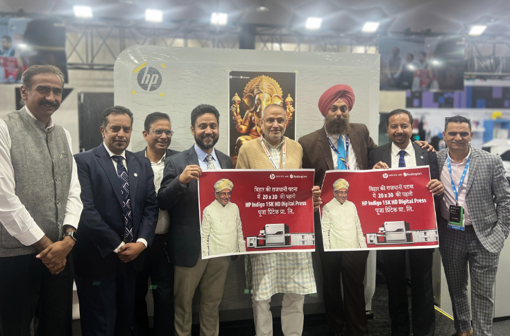 Lok Prakash Singh of Puja Printech announcing the installation of an HP Indigo 15K digital press at PrintPack 2025, alongside expansion into packaging and security printing applications