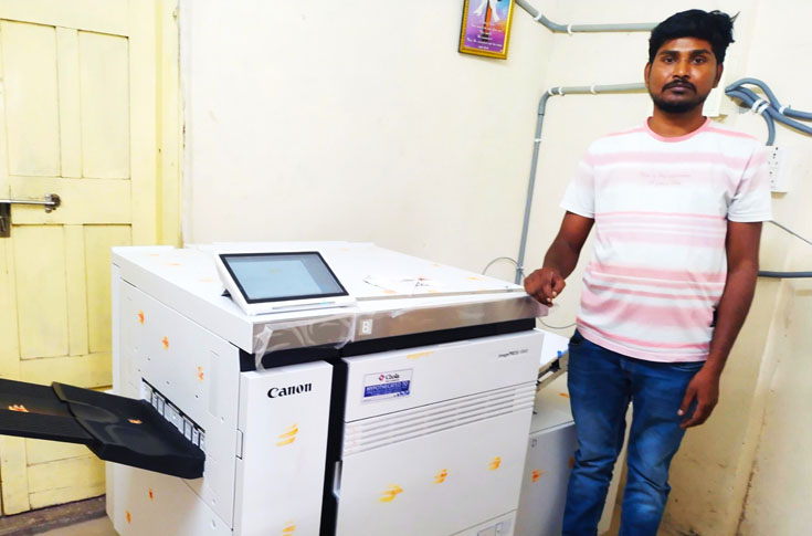 Bhavisha Digital Graphics printing unit featuring Canon ImagePress V800 digital colour production press with Server P400 and high-capacity paper feeding system, used for producing business cards, wedding cards, invitations, and corporate print materials with high-resolution output