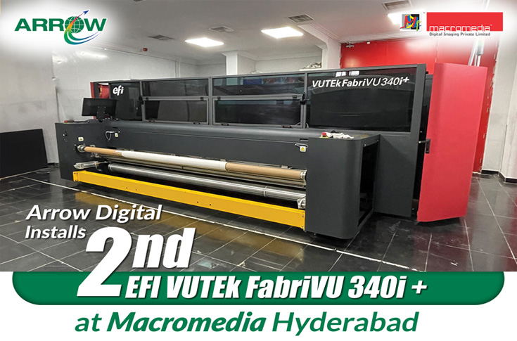Macromedia operating the EFI Vutek FabriVU 340i+ for large-format fabric graphics and soft signage production