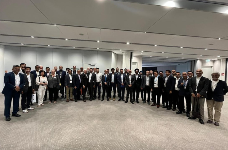 ASPA global meet at Drupa 2024 in Düsseldorf showing industry professionals discussing authentication and anti-counterfeiting technologies to secure global supply chains and protect pharmaceutical, automotive, and luxury goods