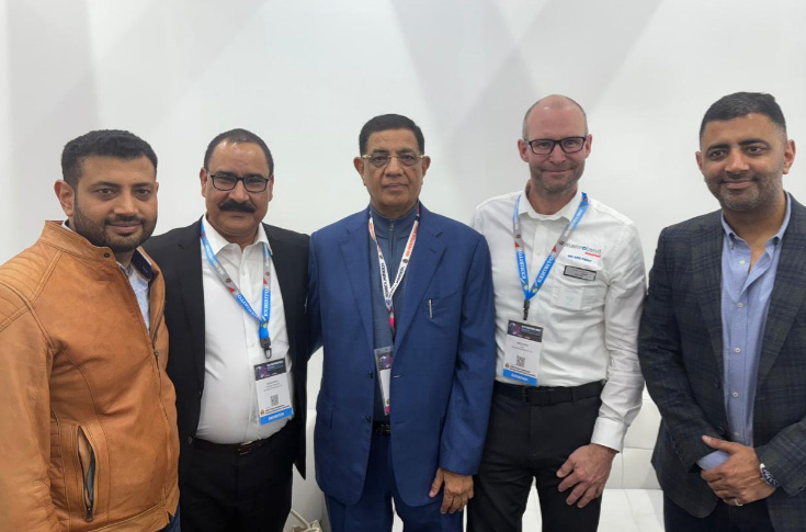 Bhuvnesh Seth of Replika Press and executives from Manroland Sheetfed including CEO Kern Mirko, celebrating the installation of the Manroland 700 Evolution at PrintPack 2025