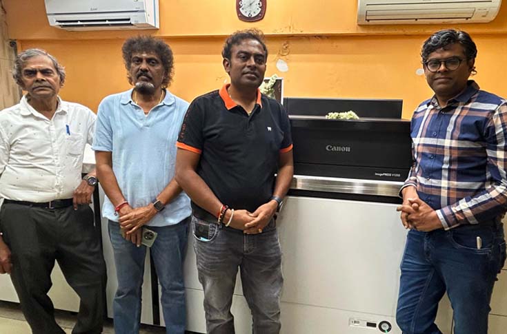 Canon imagePRESS V1350 digital colour production press installed at BOP Digi Express printing facility in Bengaluru, producing high-volume commercial prints with varied media handling and high-speed output