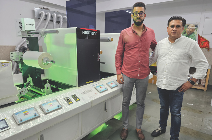 Roll-to-roll printing and finishing facility at Maa Gayatri Offset Printers in Jawalapur, showing flexo and digital label production lines, high-speed output, and industrial packaging workflow with finishing equipment