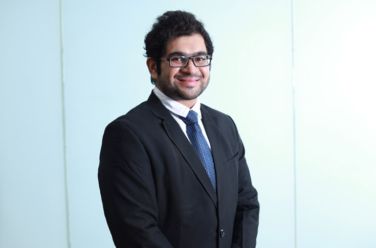 Pratham Technologies showcasing automated outsert folder, inspection systems, and commercial folder solutions at Pamex 2024 printing industry exhibition booth