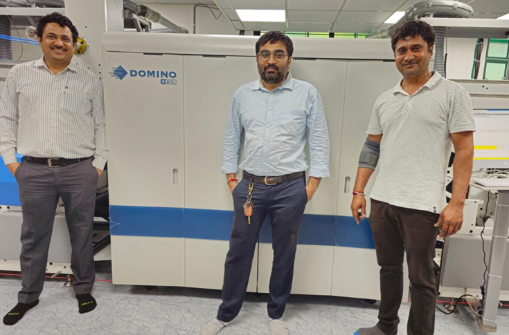 Multi Label Tech-Print team operating Domino N610i digital label press for high-quality roll-to-roll label production with colour-managed workflow