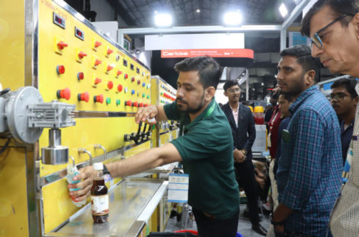 Industry professionals exploring food processing, packaging, and manufacturing technologies at Anuga FoodTec India 2024 in Mumbai