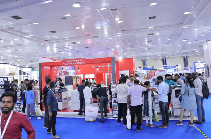 Visitors and exhibitors at PrintExpo Chennai 2025 and Media Expo Chennai exploring printing presses, digital signage systems, LED displays, and fabrication technologies in a large exhibition hall