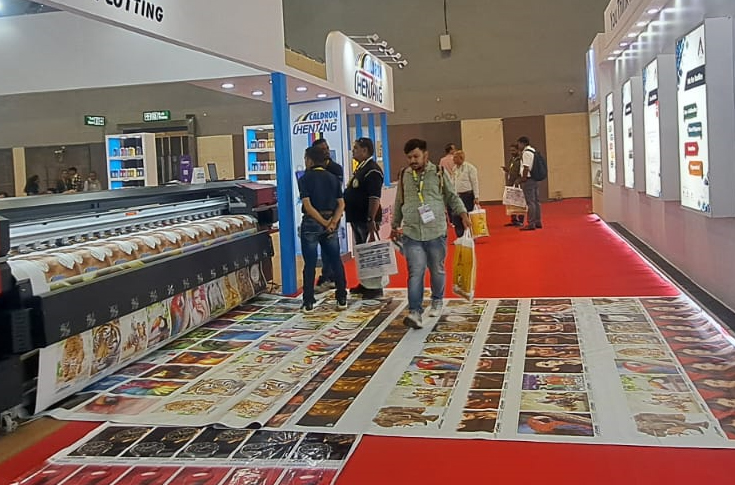 Signage and LED exhibition in India showcasing digital displays, printing technologies, eco-friendly inks, and industry professionals interacting at booths during Sign India Delhi event