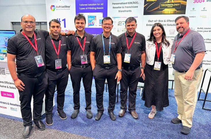 OnPrintShop AI tool interface generating product descriptions, keywords and images, demonstrated at an expo for print store automation and SEO