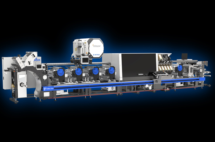 Live demonstration of sustainable metallisation technology on a digital label press, showcasing metallic label finishes and eco-friendly printing innovations at an industry exhibition