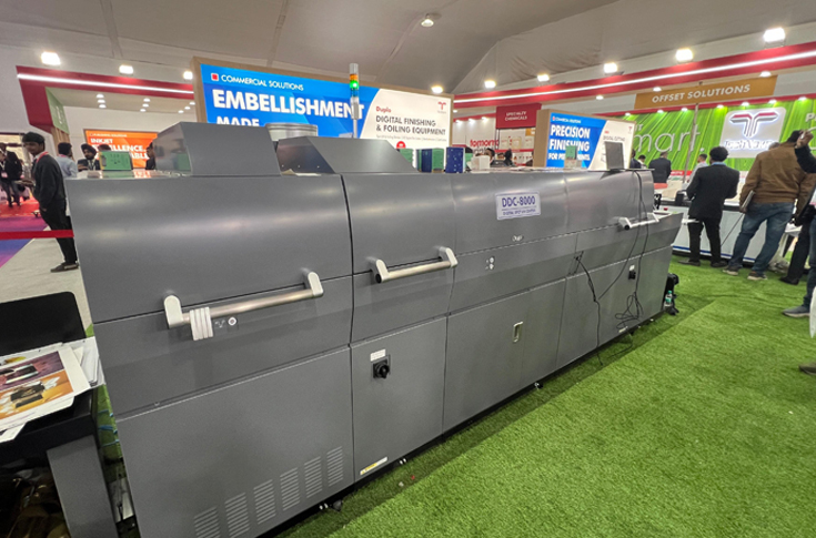 TechNova showcasing the Duplo DDC-8000 B2 digital spot UV coater with inline cold foiling for premium print finishing at PrintPack India 2025