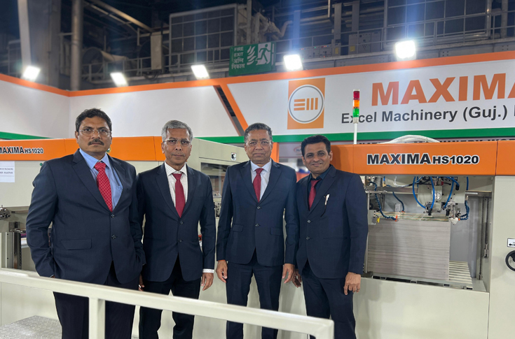 Jitendra Patel of Excel Machinery showcasing the upgraded Exb 35 die-cutting machine with extended feeder and delivery height at PrintPack India 2025