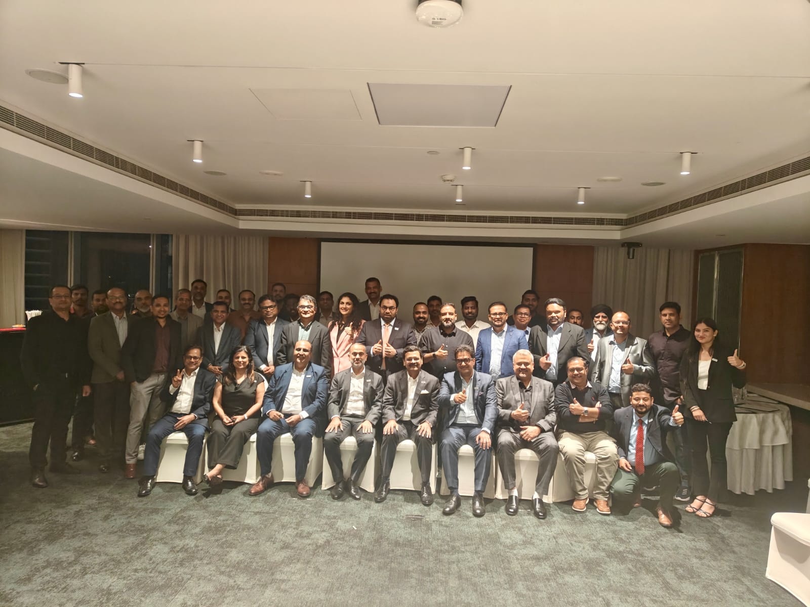 Industry delegates at ASPA MEA Open House in Dubai discussing brand protection, authentication technologies, and anti-counterfeiting strategies with packaging and traceability experts during a collaborative networking event